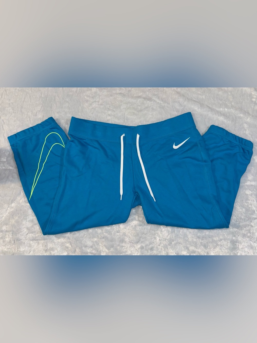 Nike Blue Track Pants with White Drawstrings & Neon Swoosh